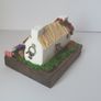 Handcrafted tiny wooden cottage Image 4