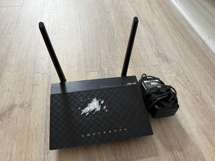 ASUS DSL-N14U Wireless N300 Modem Router.
