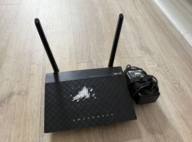 ASUS DSL-N14U Wireless N300 Modem Router.