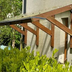 Wooden wall-mounted canopy