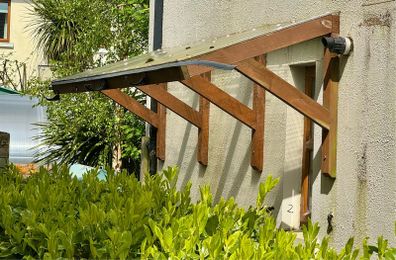 Wooden wall-mounted canopy