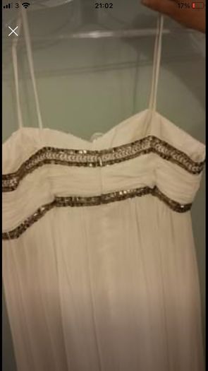 Brand new with tag designer handmade wedding dress by Dresscode. Grecian style with embellishments
