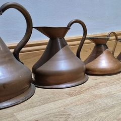 Set of 7 graduated copper Haystack / Whiskey measure jugs