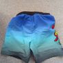 NEW.boy's swim shorts. Age 7/8 Image 4
