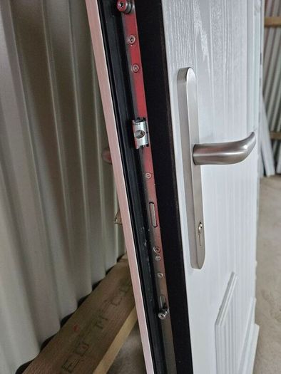 Pallido composite Door & frame in excellent condition only 1 Yr old has low threashold comes with 3 keys there is 2 side glass frosted panels optional can sell door & frame on its 0wn