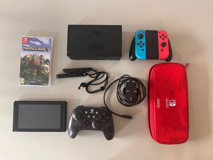 Nintendo Switch 32GB WITH Minecraft Game, Extra Controller, Carrying Case