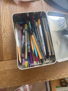 Colour pencils and writing pens