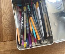 Colour pencils and writing pens