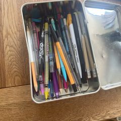 Colour pencils and writing pens
