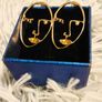 Golden Artistic Face-Shaped Earrings Minimalist Statement Jewelry Image 5