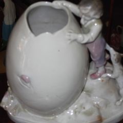 vintage porcelain figurine of a boy with a dog
