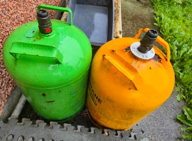 empty 13kg butane gas bottles