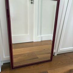 Wall mirror with burgundy frame