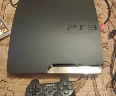 PS3 slim console, controller and games