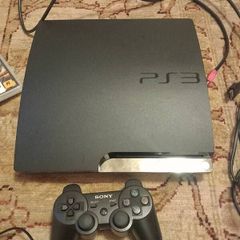 PS3 slim console, controller and games