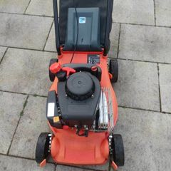 Lawnmower with plastic body in excellent condition works 100% starting first pull .