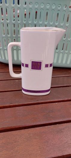 Silk Cut Purple advertising, water jug ,collectors item,,little chip on rim overall good,see pictures for condition, collectors item,,sold as seen