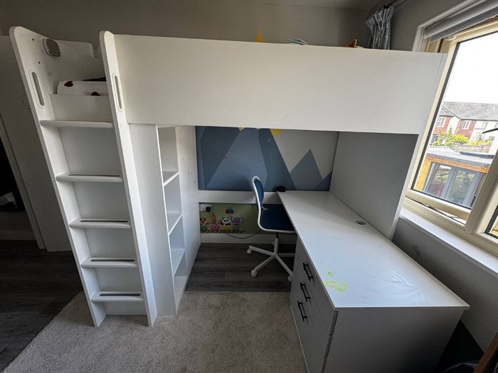 Bed with wardrobe and desk