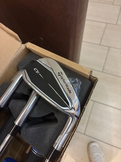 Taylormade Qi Irons 5 to SW regular flex still in the box 9 iron and 5 iron hit once wrappers still on irons