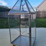 Table clock in a glass lantern. Image 4