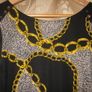 Black and Gold Patterned Dress. Image 2