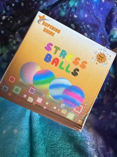 Brand new boxed stress balls x 4