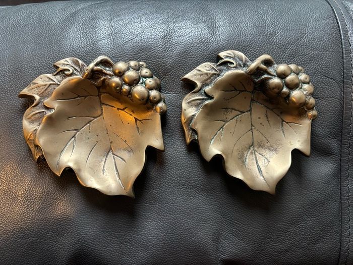 A pair of vintage solid brass grape leaf trinket dishes/ ashtrays
