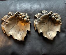 A pair of vintage solid brass grape leaf trinket dishes/ ashtrays