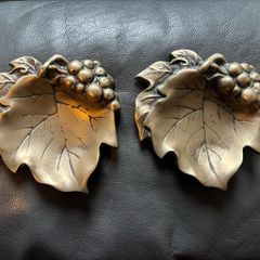 A pair of vintage solid brass grape leaf trinket dishes/ ashtrays