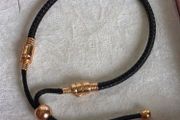 Pandora  leather cord bracelet with rose gold details