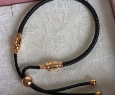 Pandora  leather cord bracelet with rose gold details