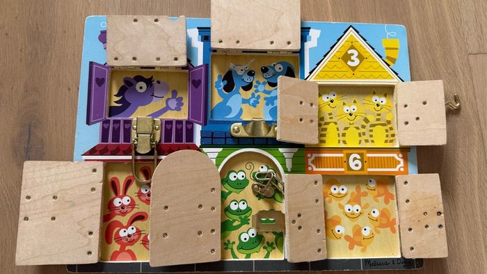 Melissa and Doug latches board