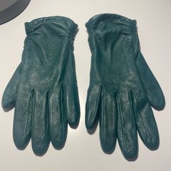 Fur-lined green leather gloves