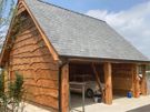 Log cabins/ car port Image 2