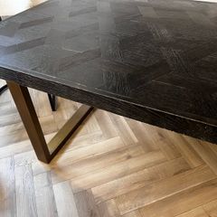 Black and gold herringbone table