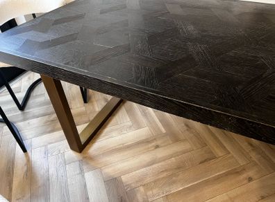 Black and gold herringbone table