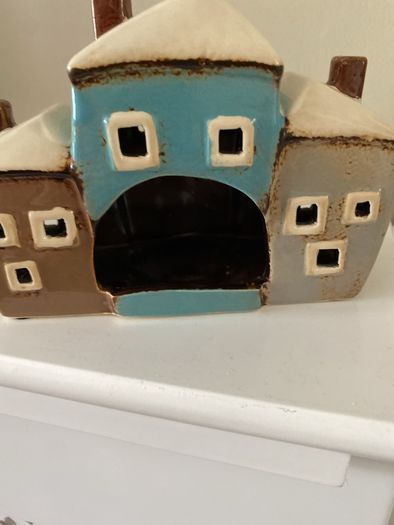 Beautiful three house village pottery tea light holder