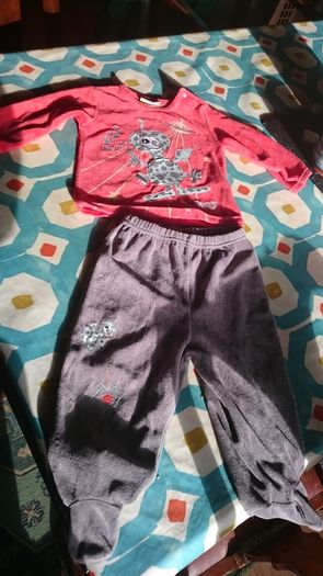 Dp am orange and brown pyjamas, top and matching pants,