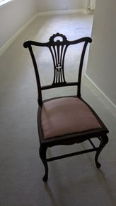 Antique style mahogany dining chair with pink upholstered seat