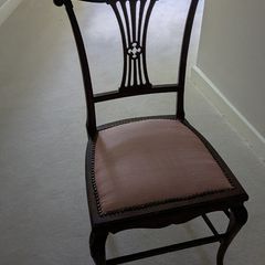 Antique style mahogany dining chair with pink upholstered seat