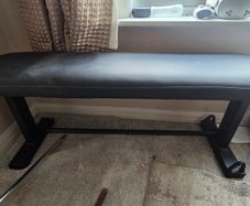 Weight bench with pull bar