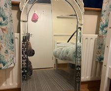 Ornate large mirror.