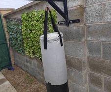 Punch bag with gloves and bracket