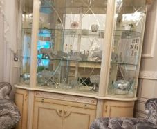 Italian cabnet display unit perfect condition has light inside and glass doors  glass shelfs and mirror background need gone ASAP