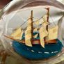Miniature Antique Tall Ship in a Triangular Dimpled Bottle Image 3