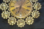 West German Acctim quartz Working Wall Clock featuring a gold-toned Starburst or Petal Design, Postage Available or Collection