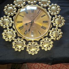 West German Acctim quartz Working Wall Clock featuring a gold-toned Starburst or Petal Design, Postage Available or Collection