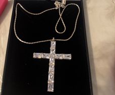 Beautiful silver cross and chain with diamonds was never worn would be a beautiful Christmas present or birthday present