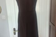 Boohoo jumpsuit Dark chocolate brown jumpsuit with gathered waist. Slight stretch in material.  Says sz 12 but small fitting.