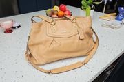 Genuine Coach brown leather ladies handbag.